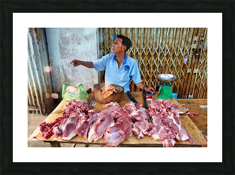 Local butcher selling meat in Phu Quoc market area Picture Frame print