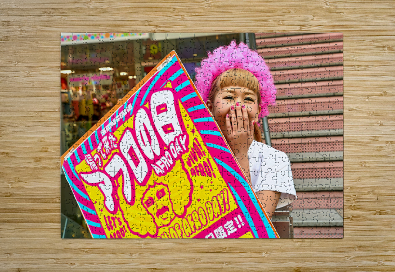 Lolita girl holds sign in Shibuya District of Tokyo during Afro  Puzzle 1