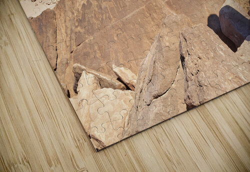 Namibia. A guide shows prehistoric rock engravings in Twyfelfontein archaeological site Marco Brivio puzzle