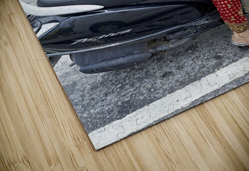 India Rajasthan Udaipur. A beautiful smiling girl on a scooter Marco Brivio puzzle