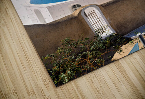 Santorinis iconic blue dome church and caldera seascape. Marco Brivio puzzle