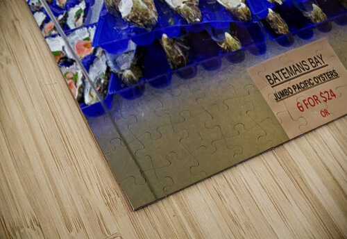 Fresh oysters on display at a seafood market. Marco Brivio puzzle