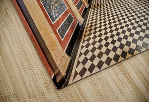 Historic church corridor with ornate arches and checkered floor. Marco Brivio puzzle