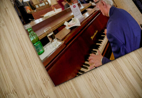 Man playing piano in an ornate bustling cafe. Marco Brivio puzzle