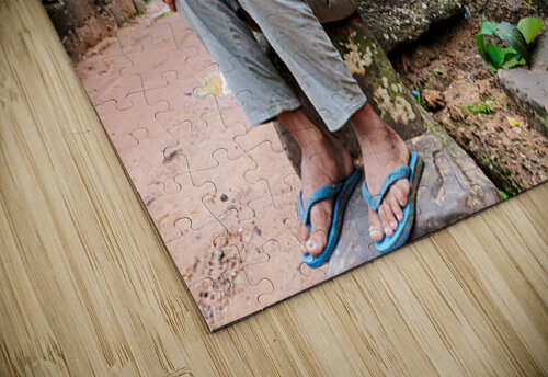 Young person sits on ancient temple ruins. Marco Brivio puzzle