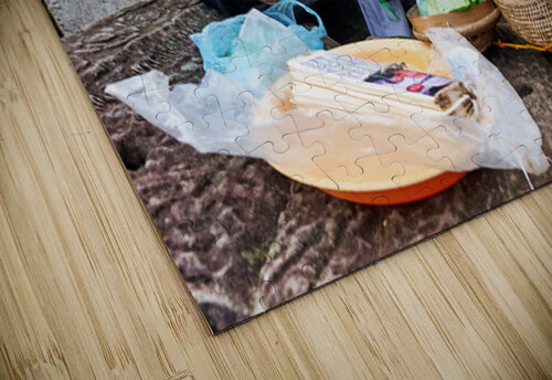 Elderly person selling goods at ancient temple ruins. Marco Brivio puzzle