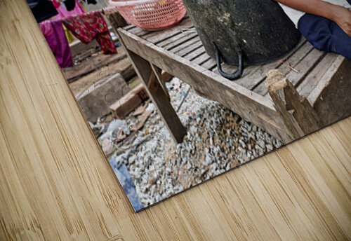 Boy with food tray clothes drying in background. Marco Brivio puzzle