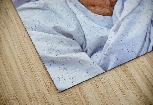 Smiling elderly Asian woman in white robe. Marco Brivio puzzle