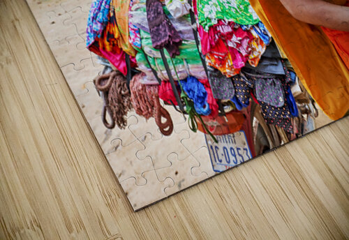 Monk with colorful textiles on a motorcycle. Marco Brivio puzzle