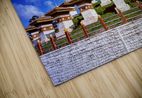 Traditional Bhutanese chortens on a green hill blue sky. Marco Brivio puzzle
