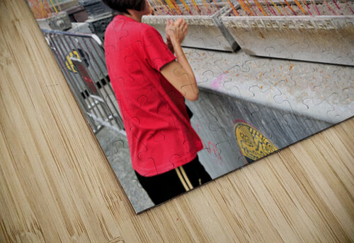 Woman prays with incense at colorful Chinese temple in Hong Kong Marco Brivio puzzle
