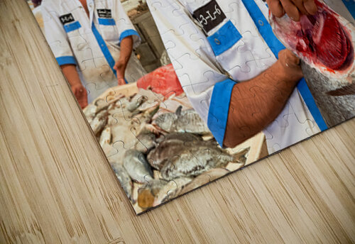 Fishmongers show fresh catch at market in Dubai UAE Marco Brivio puzzle