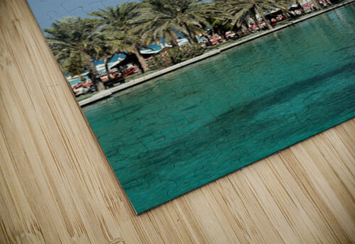 Burj Al Arab hotel stands tall by the water with palm trees Marco Brivio puzzle