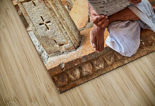 Man reads newspaper on street in Jaisalmer Rajasthan India Marco Brivio puzzle