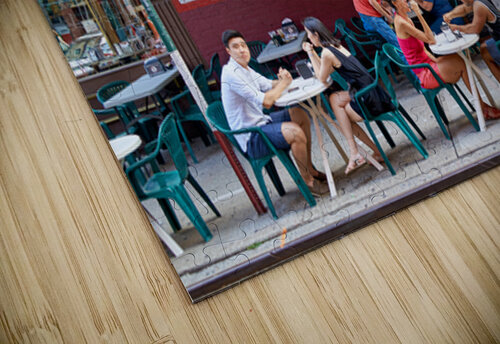 Visitors enjoy pastries at Caffe Roma in Little Italy New York Marco Brivio puzzle