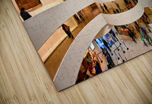 People walk and observe art in the Solomon R Marco Brivio puzzle