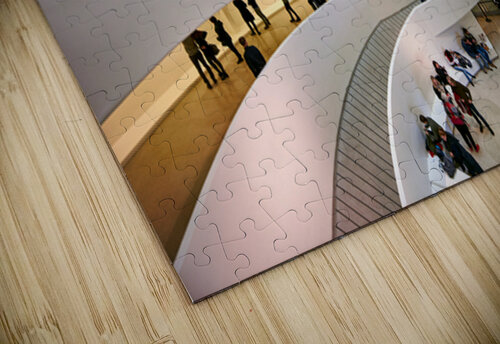 People walk through the spiraled structure of Solomon R Marco Brivio puzzle