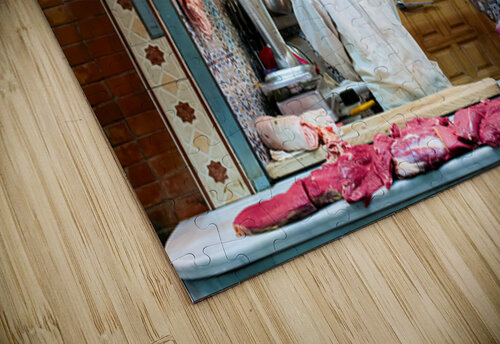 Butcher sells camel meat in the souk of Meknes Morocco Marco Brivio puzzle