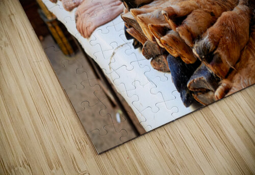 Butcher working in Meknes souk with various cuts of meat Marco Brivio puzzle