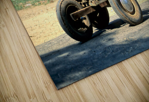 Boy pushes a cart down the street in Myanmar during the day Marco Brivio puzzle