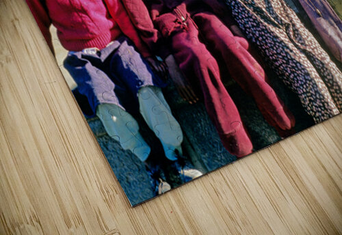 Smiling children and youth gather by a fountain. Marco Brivio puzzle