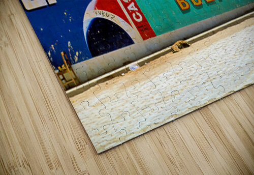 Welcome to Bolivia sign on a wall with old ads. Marco Brivio puzzle