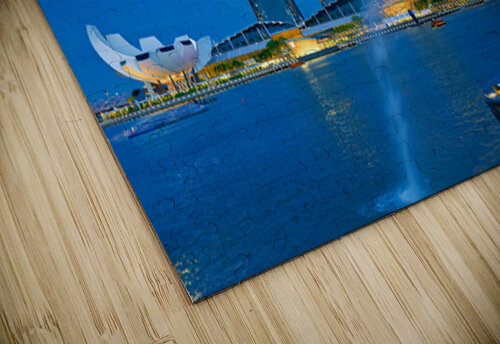 Visitors watch the Merlion fountain at Marina Bay during sunset Marco Brivio puzzle