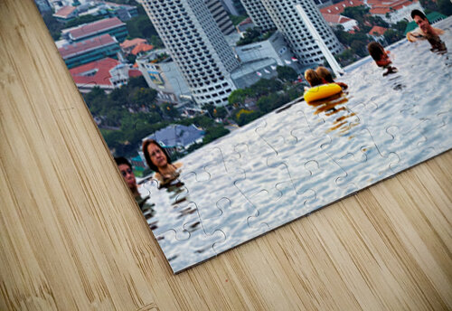 Visitors enjoy the Infinity Pool at Marina Bay Sands Marco Brivio puzzle