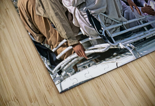 Group traveling on top of a van in Pakistans mountains Marco Brivio puzzle