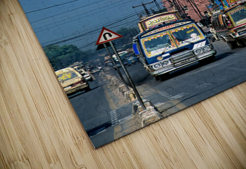 Busy street scene with tall tower in Peshawar Pakistan Marco Brivio puzzle