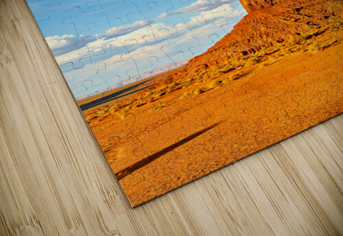 Monument Valley shows red rock formations under blue sky Marco Brivio puzzle