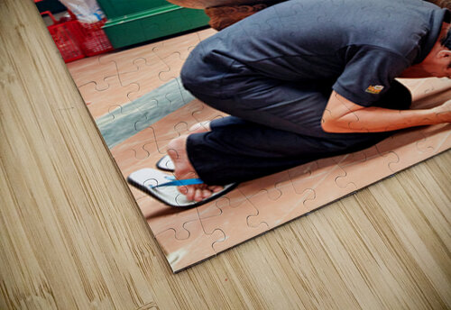 Man praying at a shrine in Ho Chi Minh City Vietnam Marco Brivio puzzle