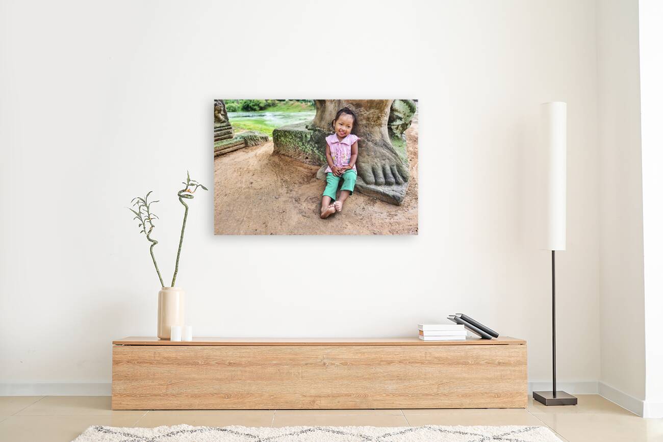 Portrait of a cute child at Preah Khan Temple. Siem Reap. Cambodia Reproduction