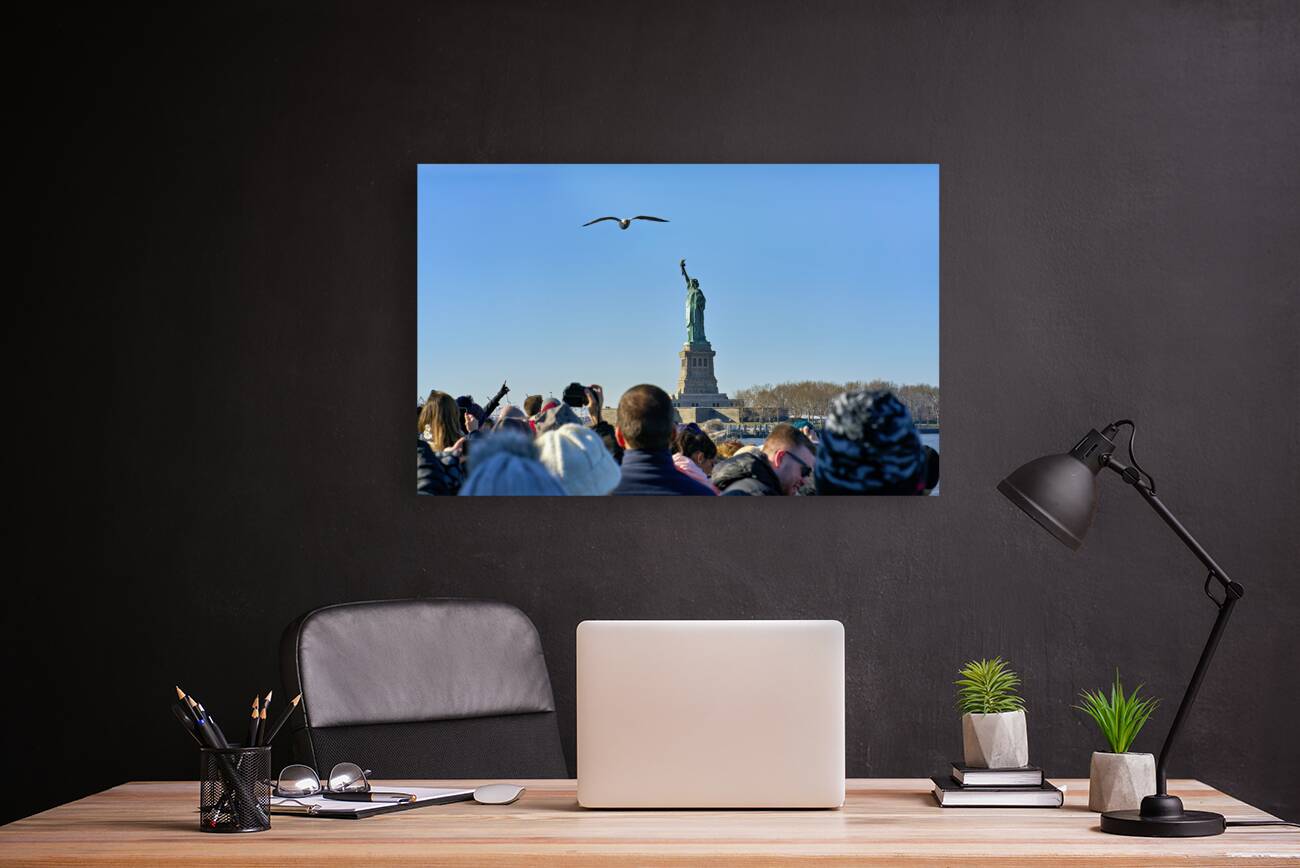 New York. Manhattan. United States. Tourists approaching Liberty Island by ferry Reproduction