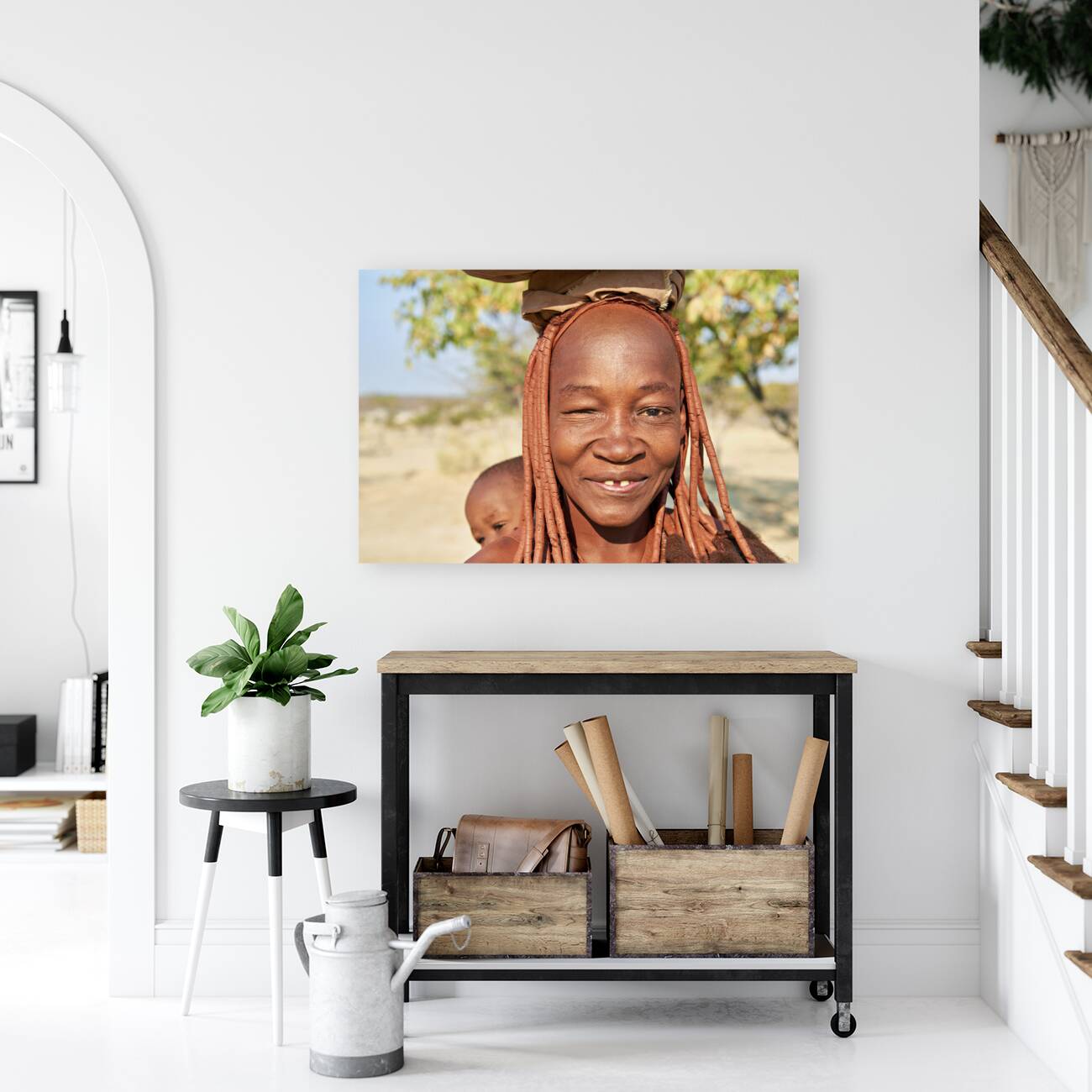 Namibia. Portrait of a smiling Himba woman with her baby in Kunene region Reproduction