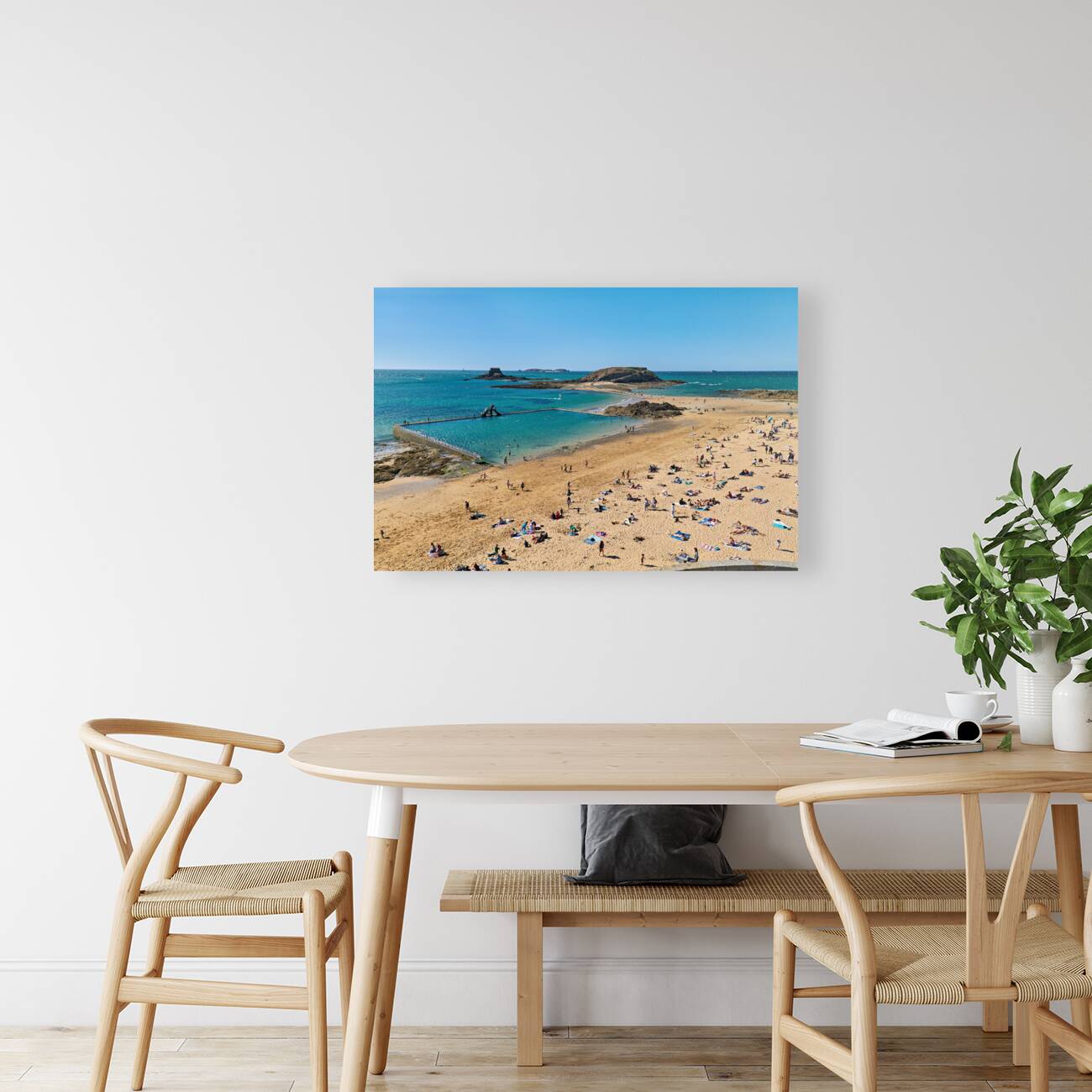 Saint Malo Brittany France. Sunbathers at plage du Mole Mole beach Reproduction