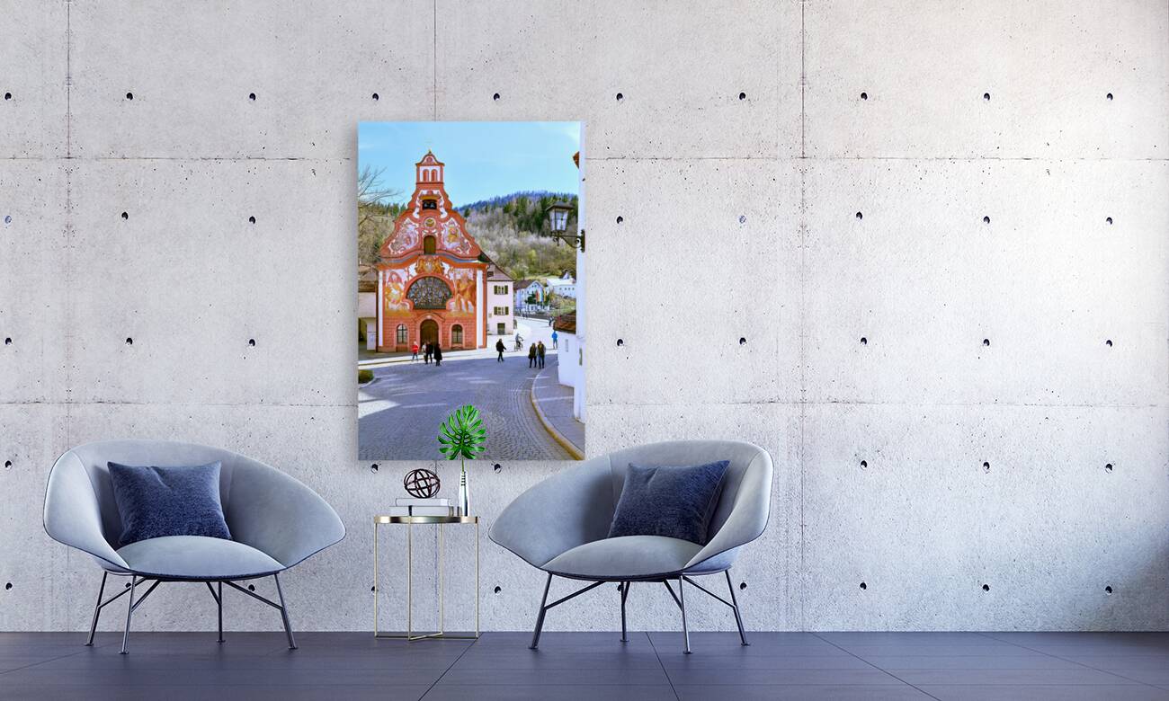 Germany Bavaria Romantic Road. Fussen. Heilig-Geist-Spitalkirche Holy Spirit Hospital Church and its rococo painted facade Reproduction