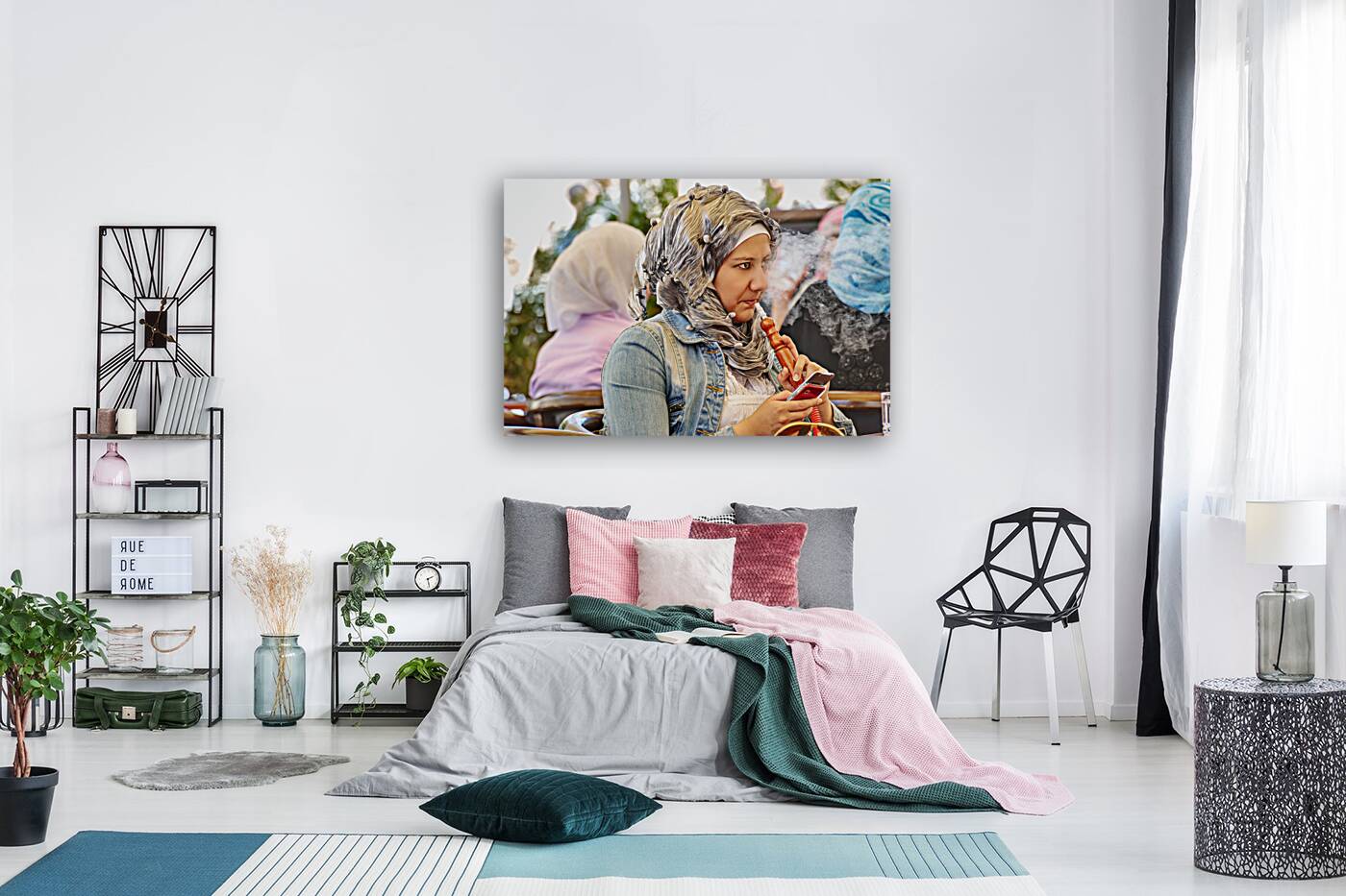 Syria. Aleppo. Girl smoking hookah and looking at her smartphone Reproduction