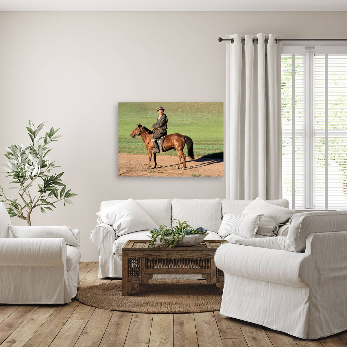 Mongolia. A sheperd riding his horse. Reproduction