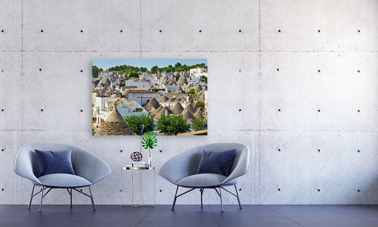 Apulia Puglia Italy. Alberobello. Trulli: traditional Apulian dry stone huts with a conical roof. Reproduction