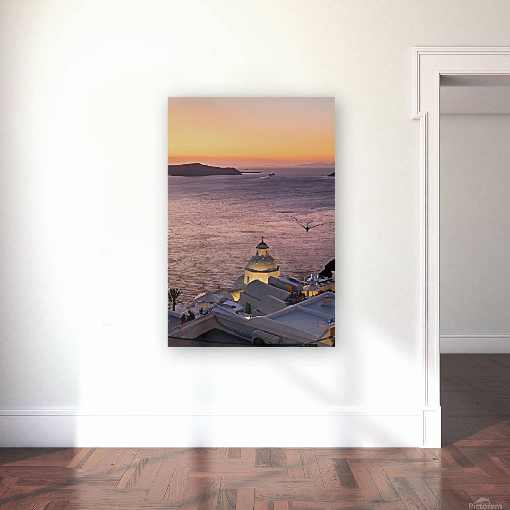 Sunset over Santorini caldera with church and boats. Reproduction