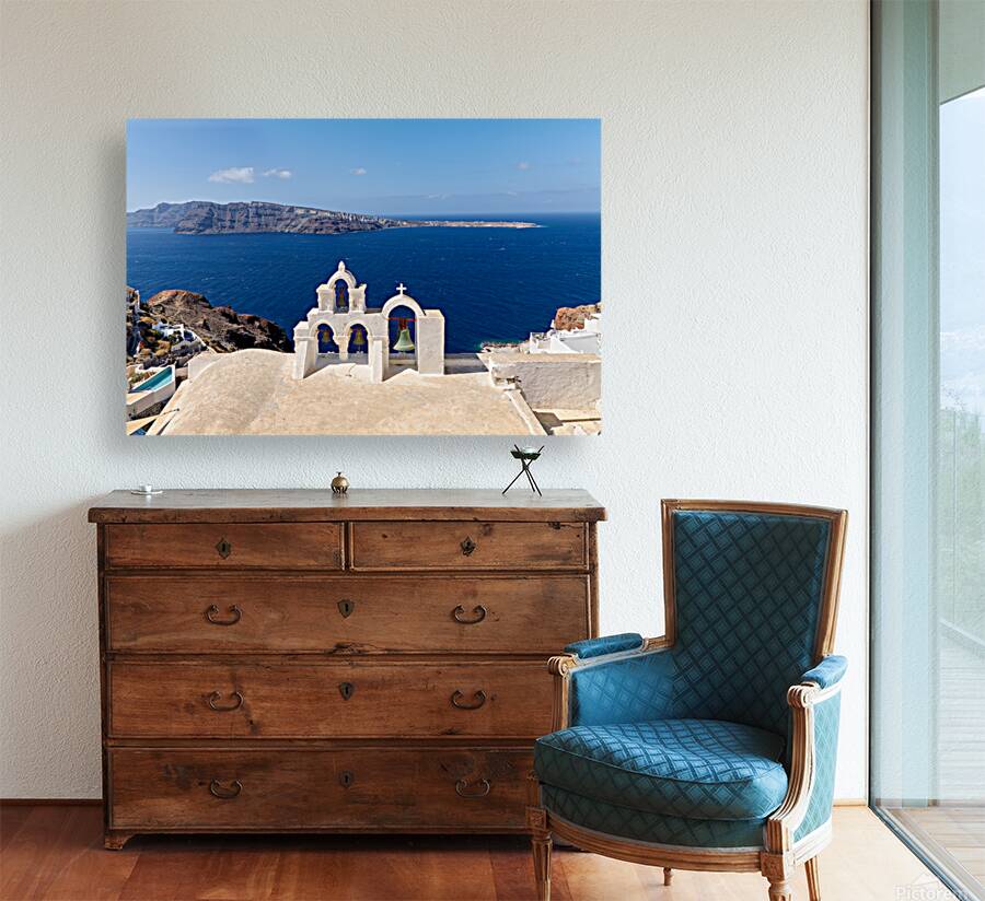 Iconic Santorini bell tower overlooking the caldera and Aegean S Reproduction