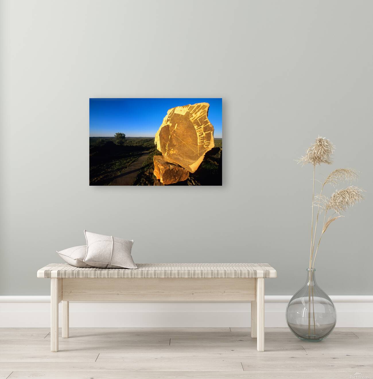 Carved stone monument in the Australian outback at sunset. Reproduction