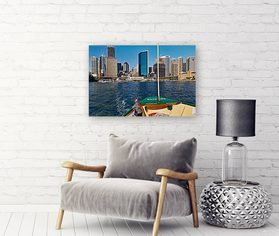 Sydney skyline viewed from a ferry on a sunny day. Reproduction