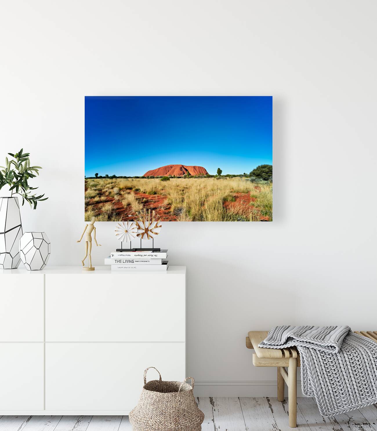 Uluru Australias iconic sandstone monolith under a clear blue Reproduction