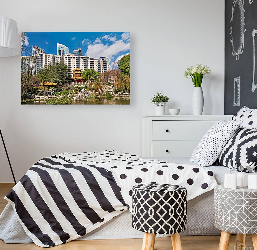 Chinese garden with pagodas and modern buildings Reproduction