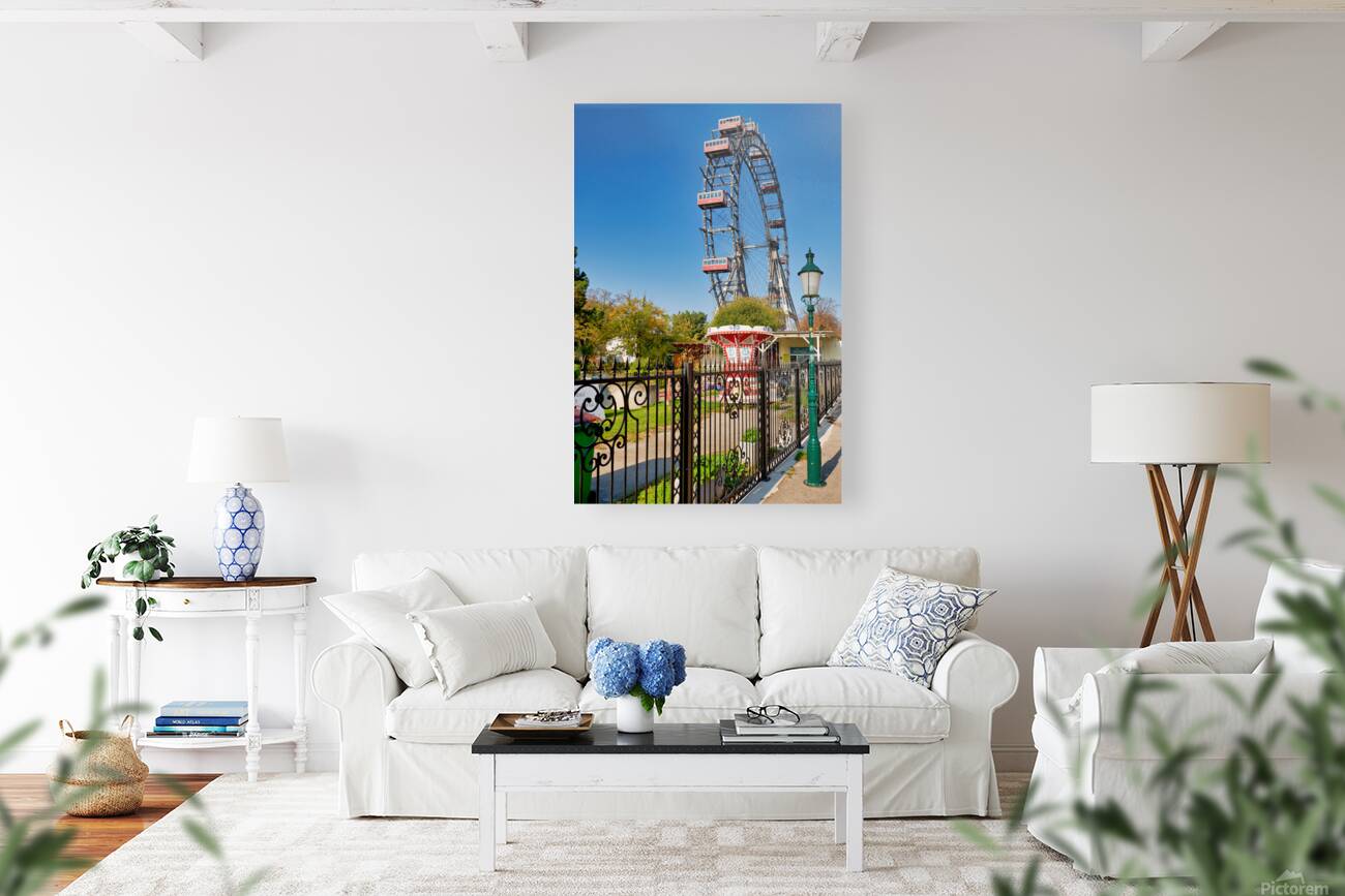 Prater Ferris wheel and carousel under a clear blue sky. Reproduction