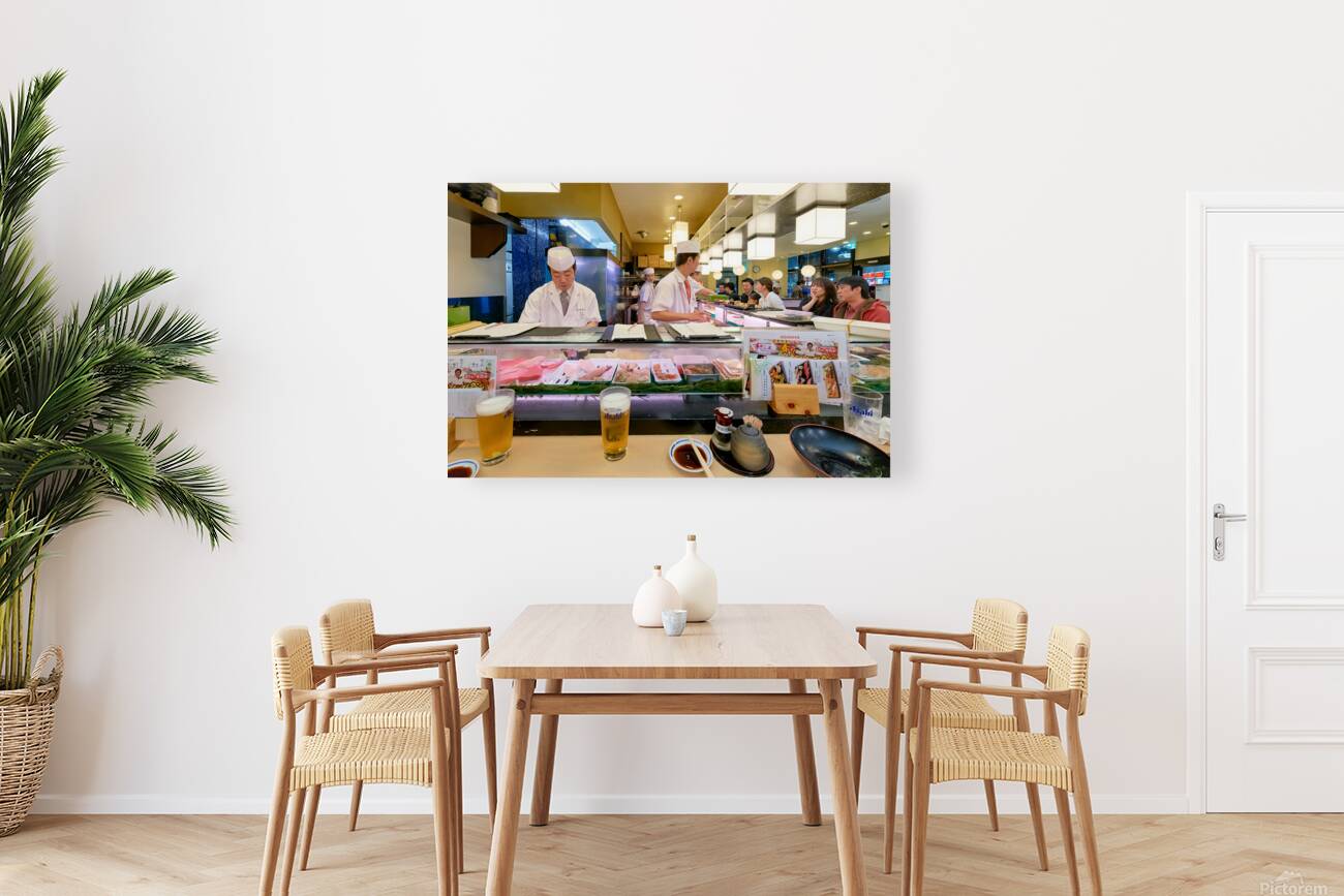 Sushi bar in Shibuya district with chefs and guests enjoying mea Reproduction