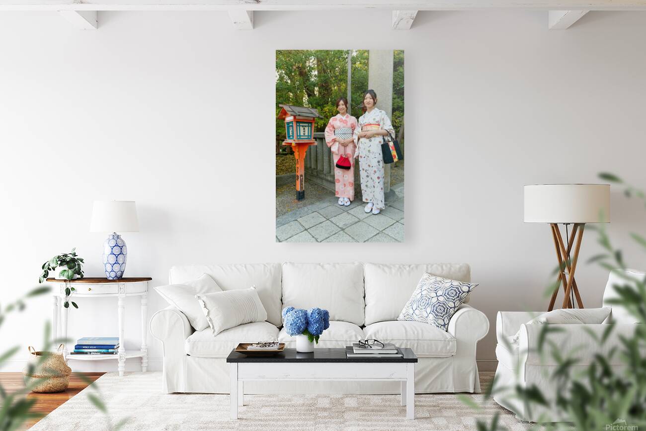 Young women in traditional kimono at Yasaka Shrine in Kyoto Reproduction