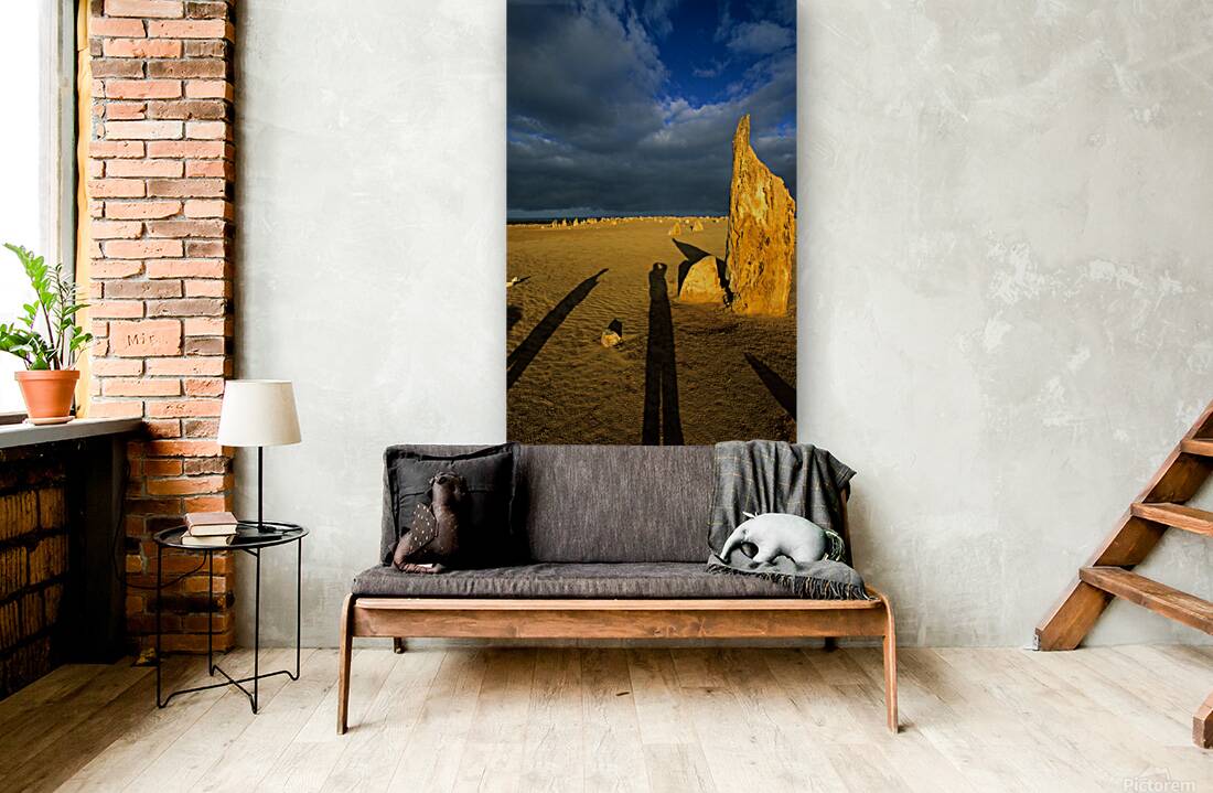 Photographers shadow falls on the Pinnacles desert at sunset. Reproduction
